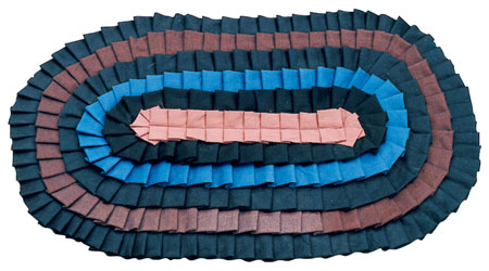 This simple pleated and shirred rug is made from sewn-together fabric scraps.